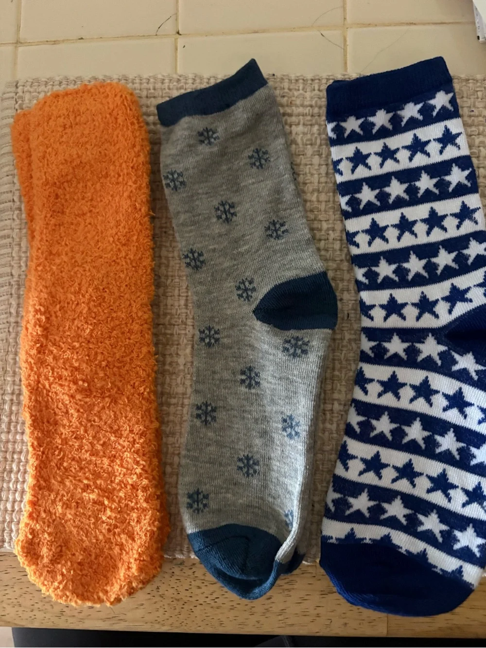6 pairs of multi colored women’s socks.